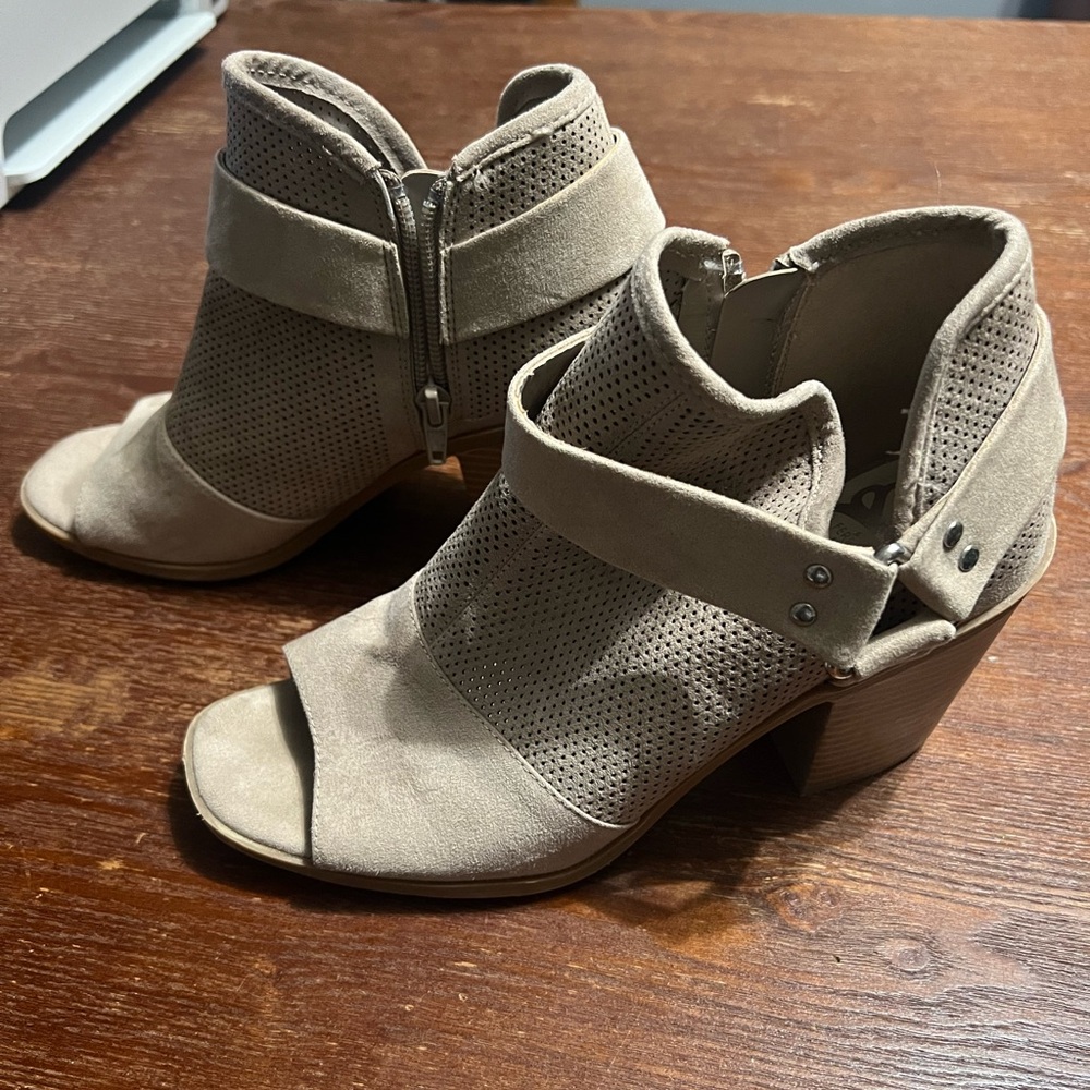 Taupe colored open-toed booties